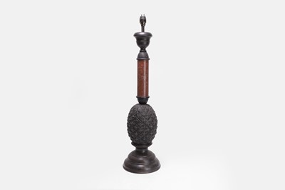 Lot 88 - A patinated bronze and marble table lamp