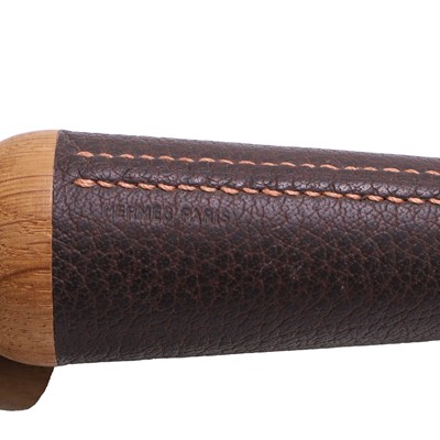 Lot 1336 - A set of Gucci and Hermès gardening tools