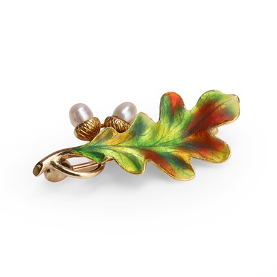 Lot 1010 - An enamel and seed pearl brooch