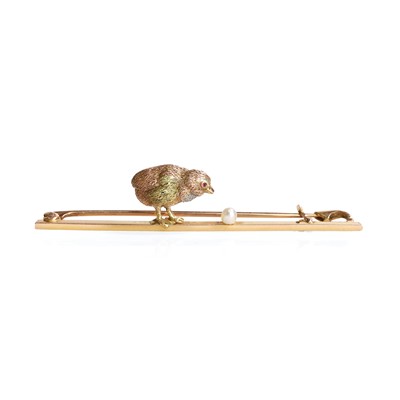 Lot 1031 - An early 20th century gold and seed pearl 'chick and egg' bar brooch