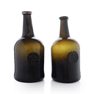 Lot 20 - A near pair of olive-green glass wine bottles