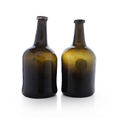 Lot 20 - A near pair of olive-green glass wine bottles