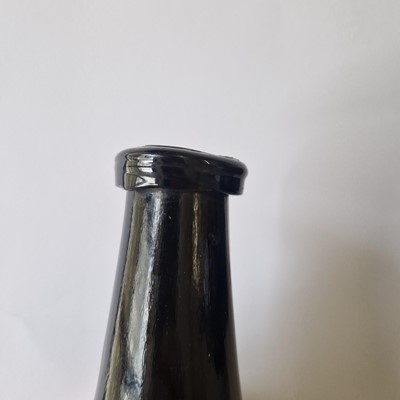 Lot 20 - A near pair of olive-green glass wine bottles