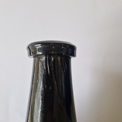 Lot 20 - A near pair of olive-green glass wine bottles