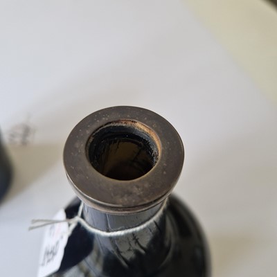 Lot 20 - A near pair of olive-green glass wine bottles