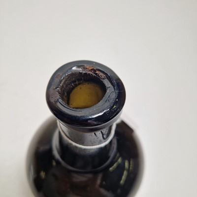 Lot 20 - A near pair of olive-green glass wine bottles