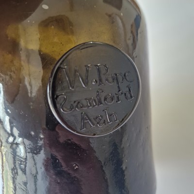 Lot 20 - A near pair of olive-green glass wine bottles