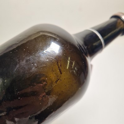 Lot 20 - A near pair of olive-green glass wine bottles