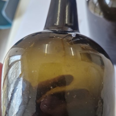 Lot 20 - A near pair of olive-green glass wine bottles