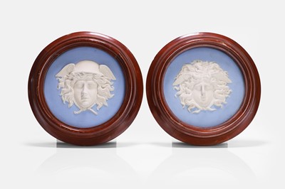 Lot 127 - A pair of Wedgwood blue jasperware plaques