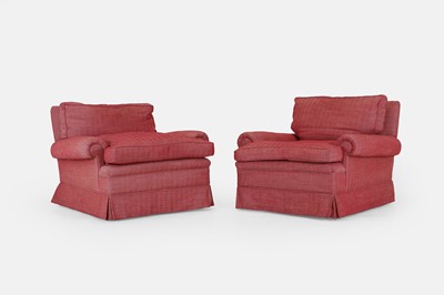 Lot 554 - A pair of upholstered armchairs by Colefax and Fowler