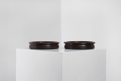 Lot 310 - A pair of Regency-style mahogany bottle coasters