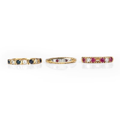 Lot 1191 - A group of three 18ct gold gemstone set rings