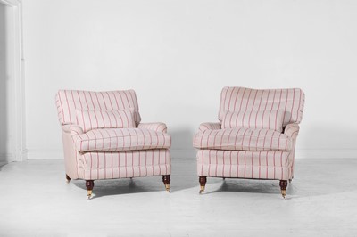 Lot 202 - A pair of upholstered armchairs in the Howard & Sons style