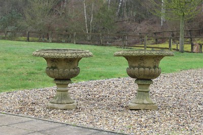 Lot 698 - A pair of garden urns