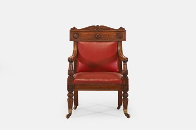 Lot 673 - A large George IV oak library armchair
