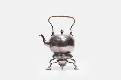 Lot 606 - A George I silver kettle, burner and stand