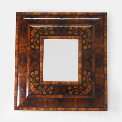 Lot 217 - A William and Mary-style olivewood and marquetry cushion-framed mirror