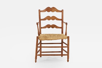 Lot 43 - A provincial ash ladder-back elbow chair
