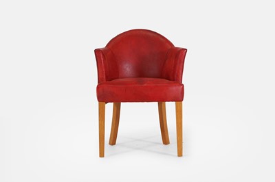 Lot 10 - A blonde oak desk chair by Howe