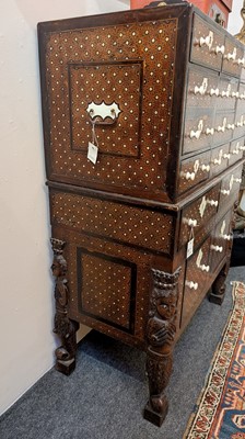 Lot 214 - An Indo-Portuguese teak, rosewood, ebony and ivory 'Contador' cabinet