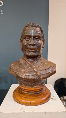 Lot 118 - A large carved kauri gum bust of Maori Chief Tamati Tamaiwhakanehua