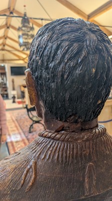 Lot 118 - A large carved kauri gum bust of Maori Chief Tamati Tamaiwhakanehua