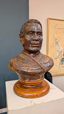 Lot 118 - A large carved kauri gum bust of Maori Chief Tamati Tamaiwhakanehua