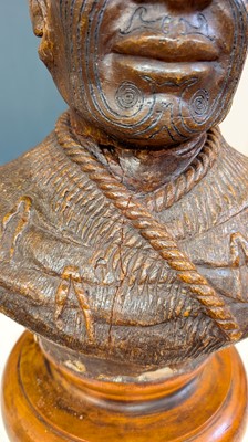 Lot 118 - A large carved kauri gum bust of Maori Chief Tamati Tamaiwhakanehua