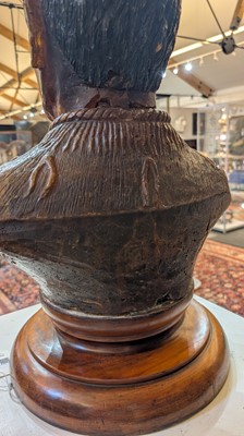 Lot 118 - A large carved kauri gum bust of Maori Chief Tamati Tamaiwhakanehua