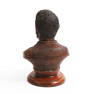 Lot 118 - A large carved kauri gum bust of Maori Chief Tamati Tamaiwhakanehua