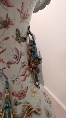 Lot 3 - A pair of large Canton 'butterfly' vases