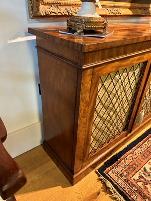 Lot 383 - A pair of Regency mahogany side cabinets