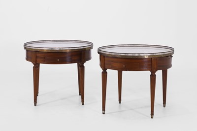 Lot 434 - A pair of Louis XVI-style mahogany and marble bouillotte tables