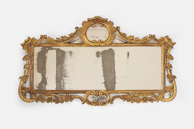 Lot 427 - A rococo carved giltwood overmantel mirror