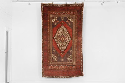 Lot 461 - A tribal wool rug