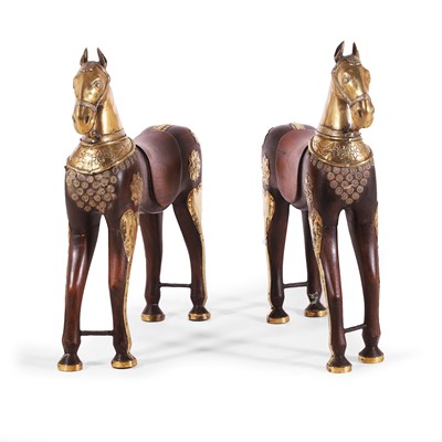 Lot 152 - A pair of brass-mounted teak processional horses