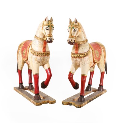 Lot 153 - A pair of large lacquered and painted wooden horses