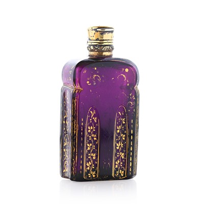 Lot 28 - An amethyst cut-glass and gilt scent bottle