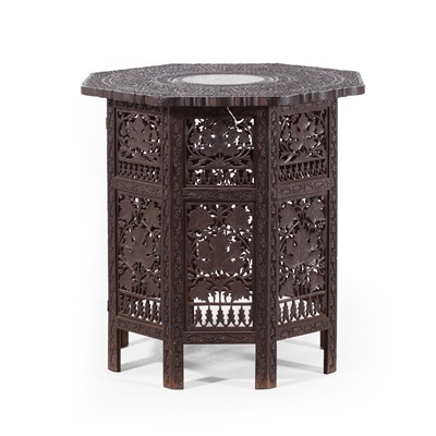 Lot 210 - A carved hardwood and ivory-inlaid occasional table