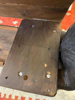 Lot 81 - A Black Forest carved linden wood bench