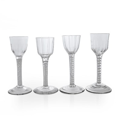 Lot 12 - A group of four opaque twist wine glasses