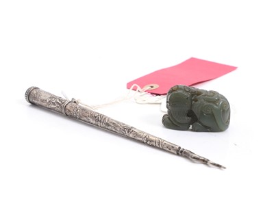 Lot 5 - A Chinese jade figure