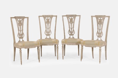 Lot 564 - A set of four Louis XVI-style painted wooden side chairs