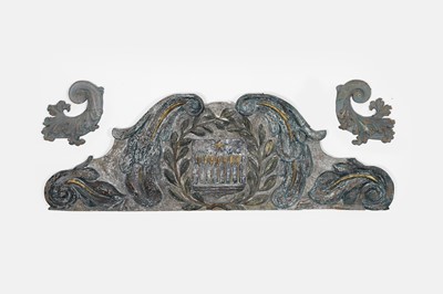 Lot 559 - A painted and parcel-gilt wooden overdoor