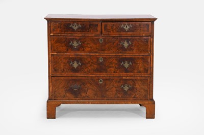 Lot 556 - A Queen Anne walnut chest of drawers