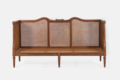 Lot 181 - A Louis XVI-style walnut canapé