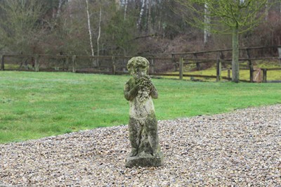 Lot 205 - A reconstituted stone putto