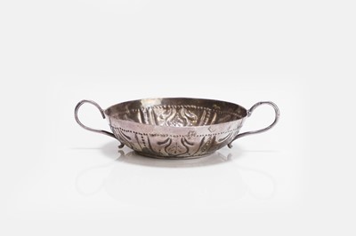 Lot 602 - A Charles II silver wine taster
