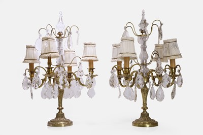 Lot 458 - A pair of brass and glass candelabra lamps